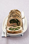 Pork roulade filled with spinach and sausage