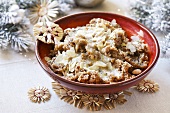 Christmas rice pudding with dried fruit and slivered almonds