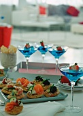 Canapés and deserts on a party buffet