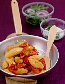 Fried Bamberg potatoes with red peppers
