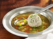 Bavarian liver dumpling soup with root vegetables