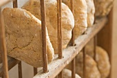 Freshly-baked bread (from wood-fired oven) in rack