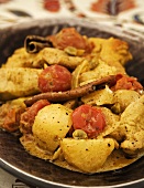 Hähnchen mit Kartoffeln und indischen Gewürzen