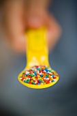 Sprinkles on spoon