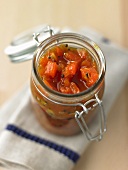 Papaya chutney in a preserving jar