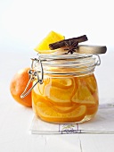Spiced orange slices in a preserving jar
