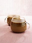 Coffee with Amarula (cream liqueur) in two glas cups