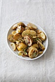 Oven-roasted potatoes with onions and rosemary