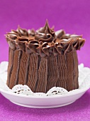 Chocolate cake on doily