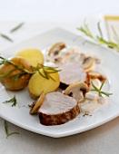 Pork medallions with mushroom sauce and potatoes