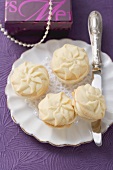 Piped biscuits with lemon cream filling for Christmas