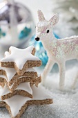 Cinnamon stars surrounded by Christmas decorations