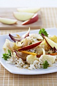 Fish curry with rice, apple and onion