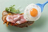 Fried egg with ham and farmhouse bread
