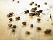 Coffee beans on wooden background