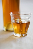 Iced tea in glass and bottle