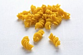 Several pieces of spiral pasta