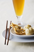 Dim sum and glass of beer (Asia)