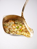 Alphabet soup in ladle
