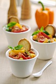 Piperade (pepper dish) with toast in small pots