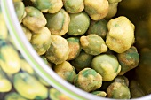 Wasabi peas in a jar (close-up)
