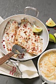 Peppered fish with coconut potato gratin