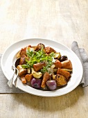 Roasted root vegetables with fresh rocket