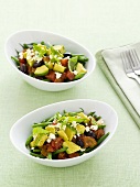 Tomato, avocado and green bean salad with olives and feta