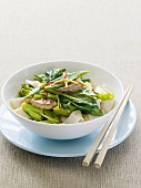 Pork with choy sum (Chinese flowering cabbage) on rice noodles