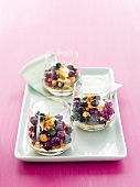 Ice cream with blueberries and amaretti in three glasses