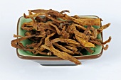 Dried lily buds in dish