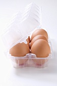 Fresh eggs in egg box