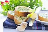 Baguette slices with herb butter and garlic