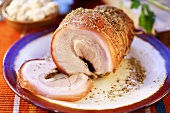 Rolled ham roast with herbs