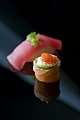 Sushi on reflective surface