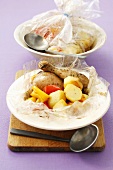 Chicken with potatoes and peppers baked in foil
