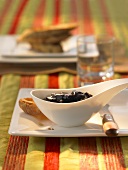 Plum and gingerbread jam with toasted baguette