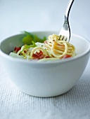 Spaghetti with tomatoes, rocket and Parmesan