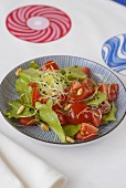 Lettuce with tomatoes, sprouts and pine nuts