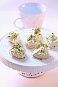 Rose meringues with pistachios