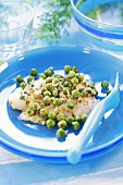 Oven-baked pangasius fillet with peas