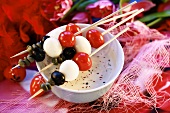 Quails' eggs, cherry tomatoes & olives on skewers (Easter)