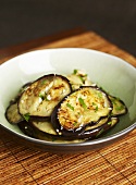 Fried aubergine slices with garlic and parsley