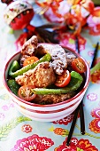 Chicken with peppers and tomatoes (China)