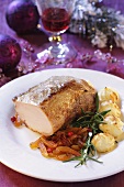 Roast pork with duchess potatoes and onions
