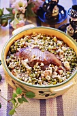 Goose with pearl barley and peas