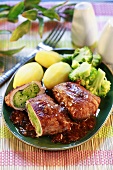 Stuffed pork escalopes with broccoli