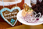 Obatzda (Camembert spread) with onion rings (Oktoberfest)