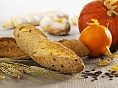 Pumpkin bread, cereal ears, pumpkin seeds and pumpkins