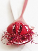 Beetroot sprouts on salad servers